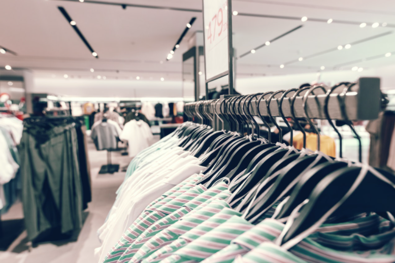 Retail store with clothes on a rack