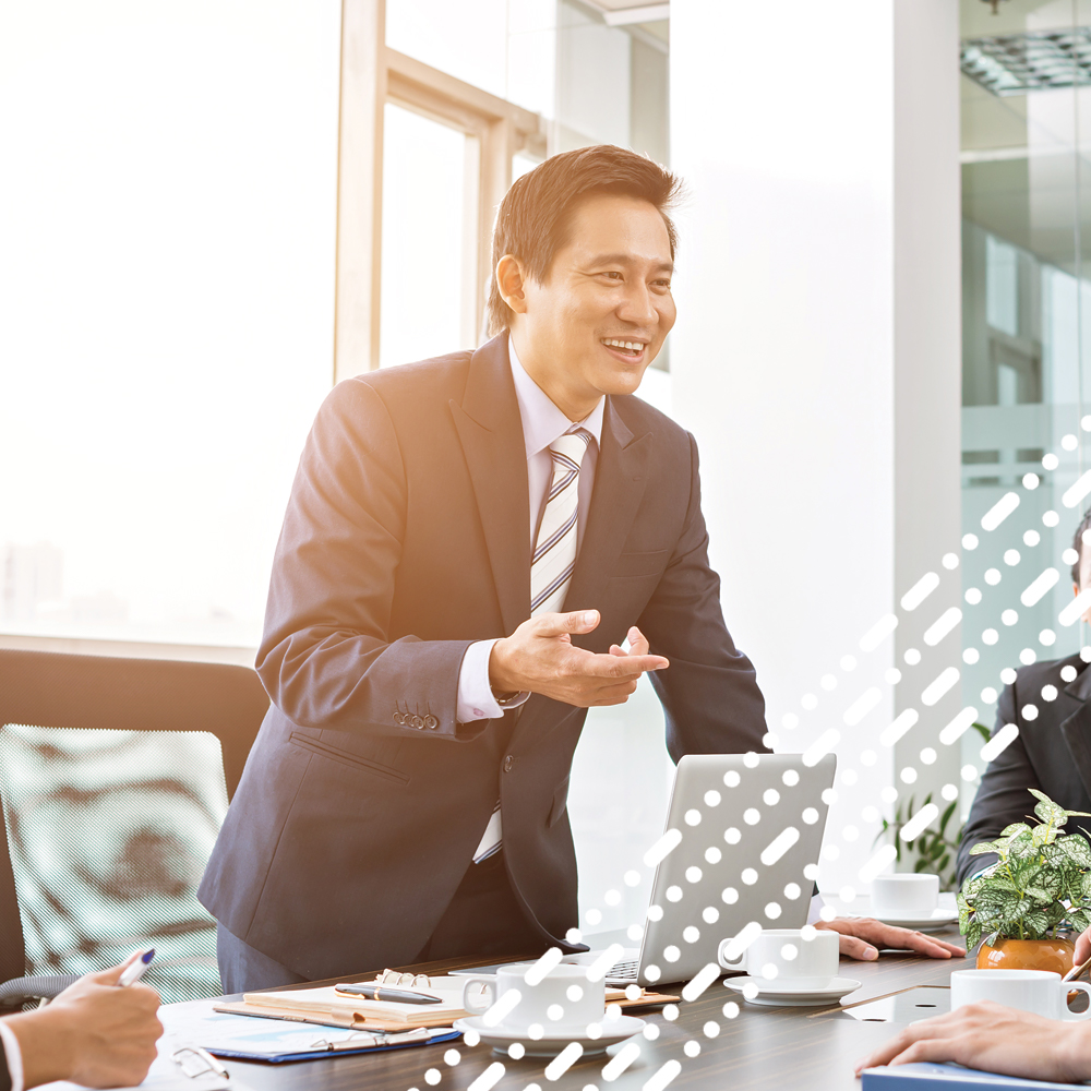 man stood up in team meeting