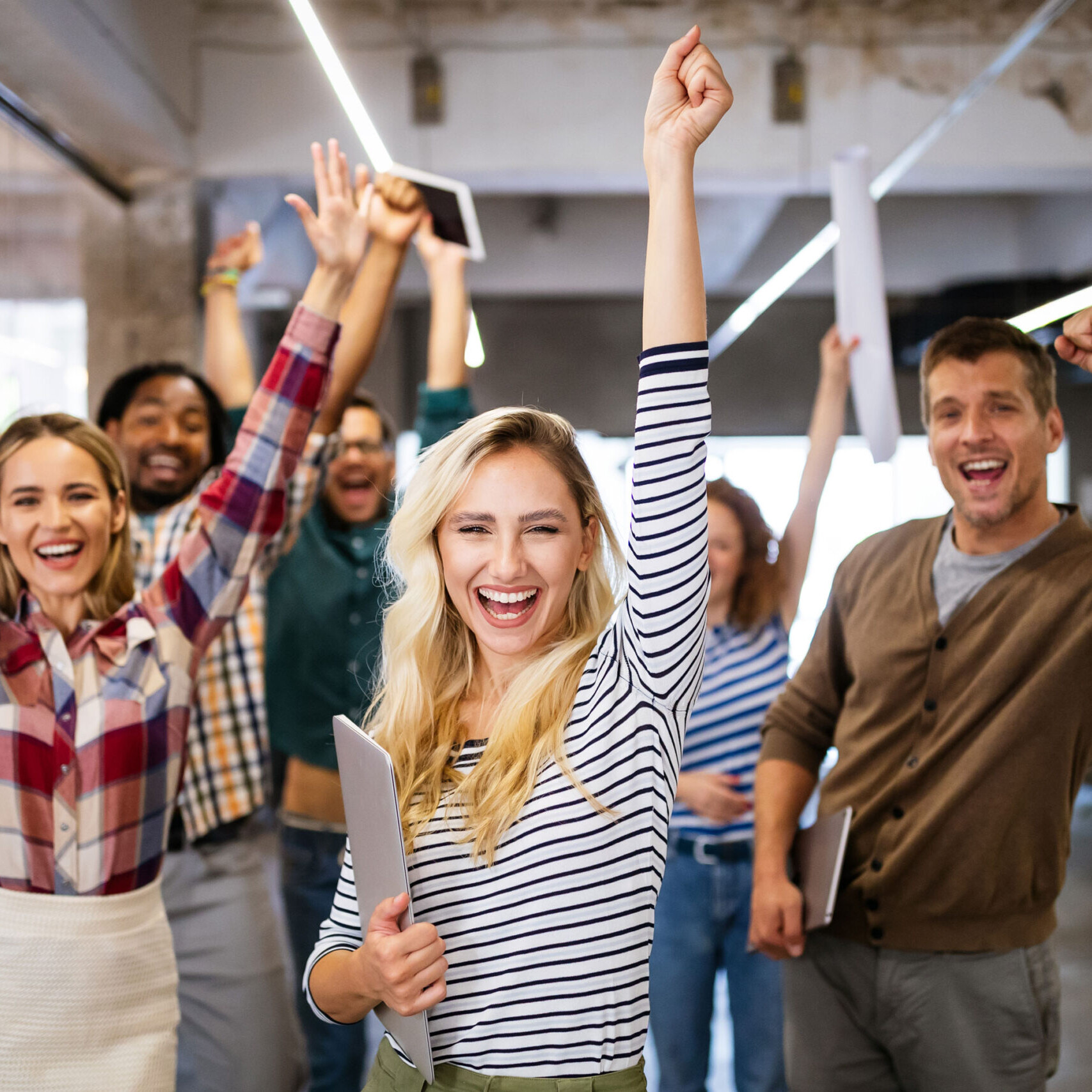 people cheering at office