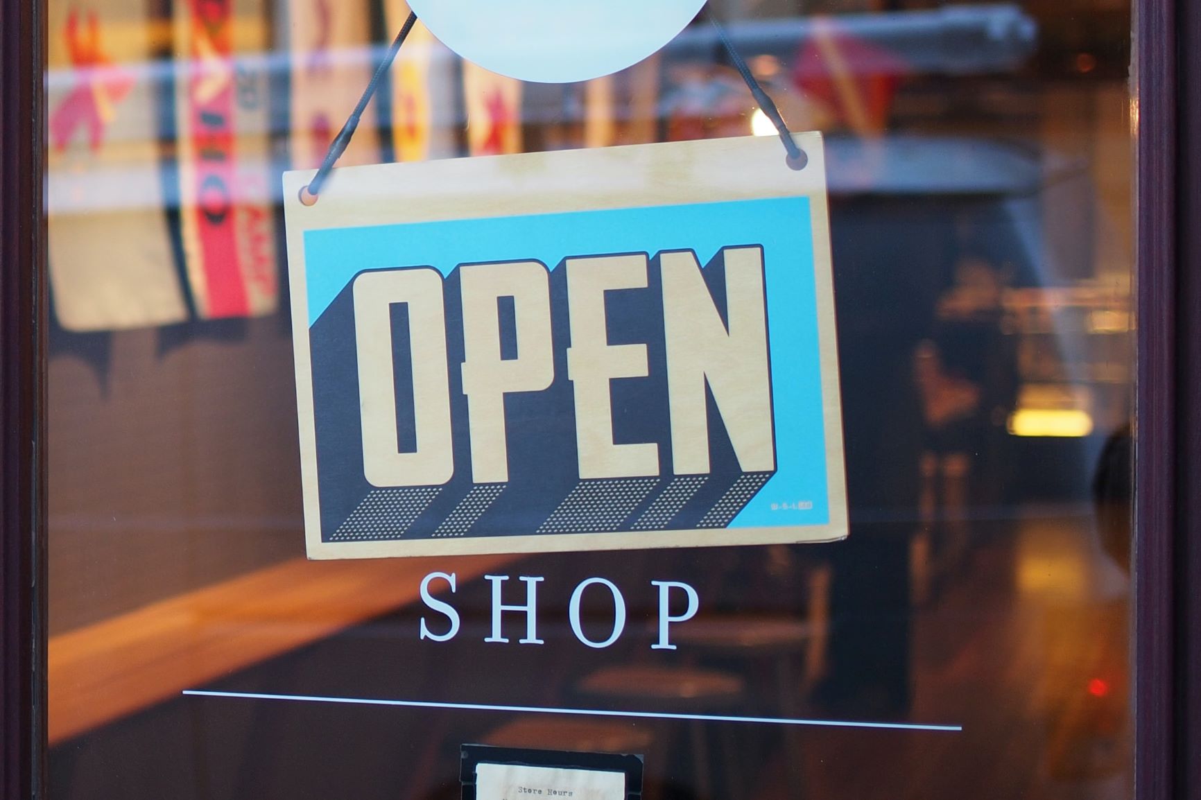 open sign on the door of a business