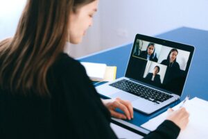 lady having a meeting on laptop