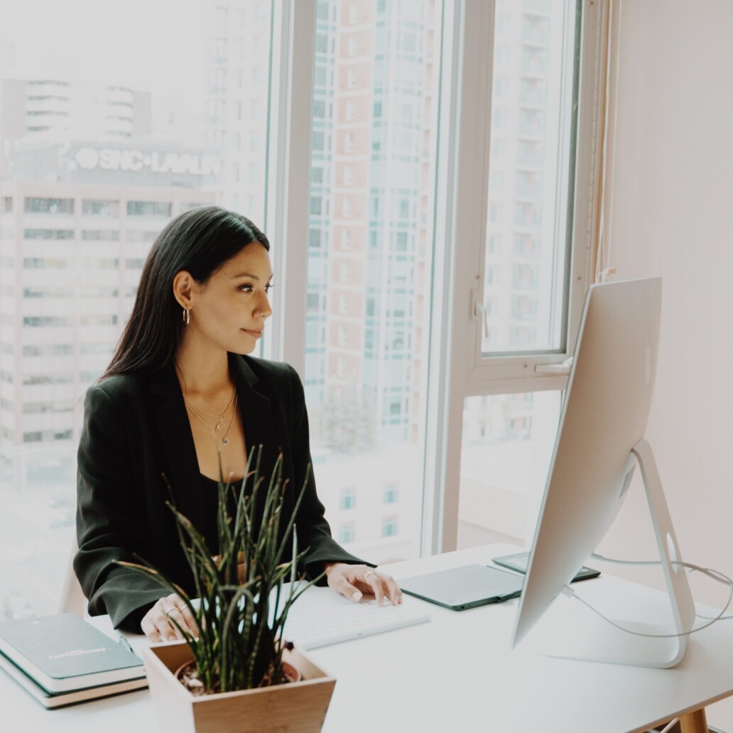 Lady working on computer at the office