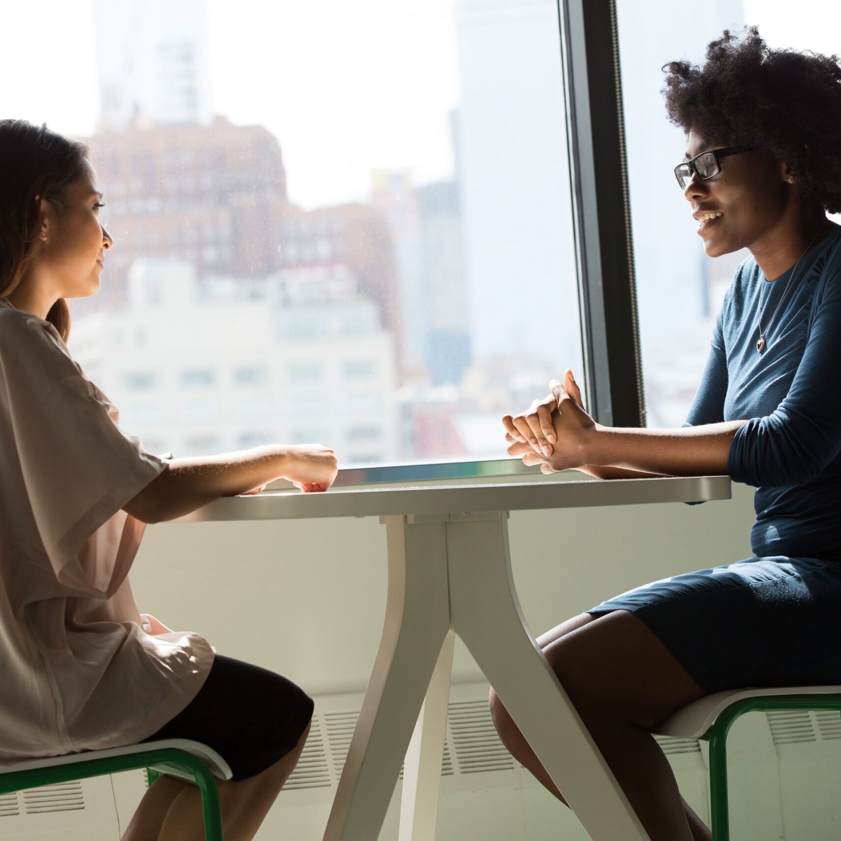 two ladies having a meeting