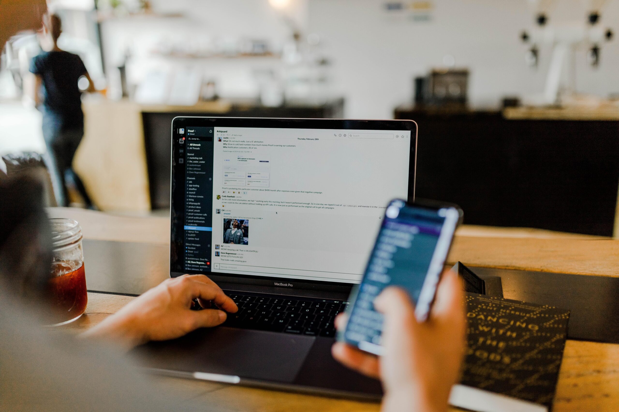 working on slack while playing with phone