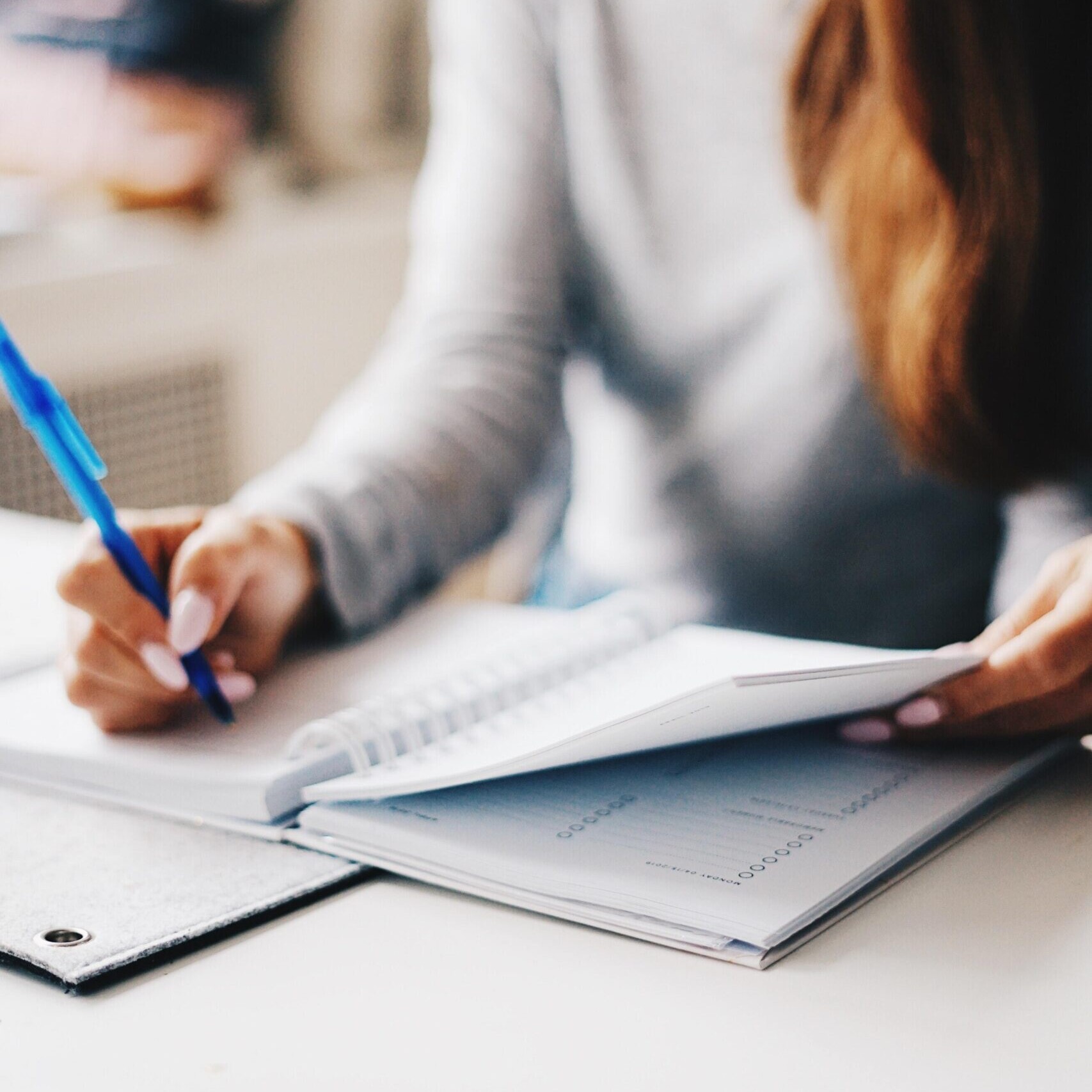 Female writing notes