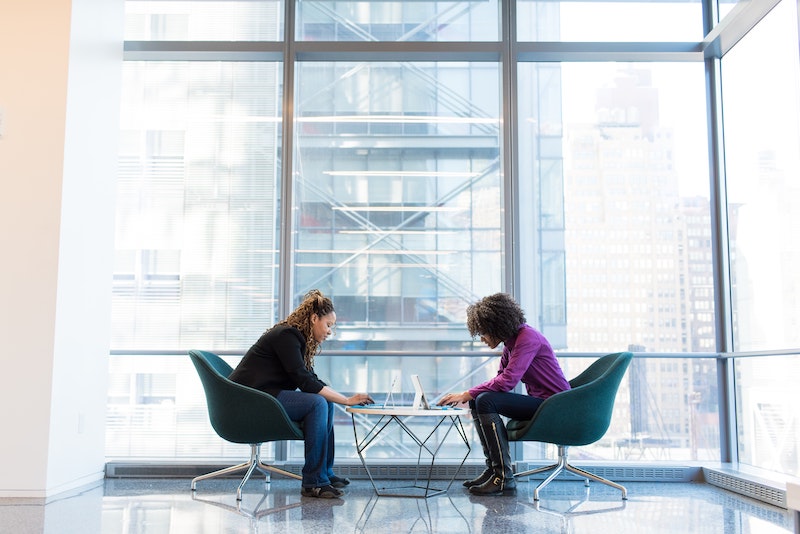 Two women working