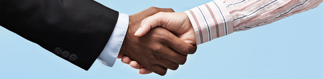 hands shaking making agreement for business development