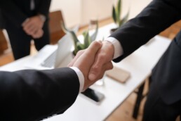 bank mergers handshake