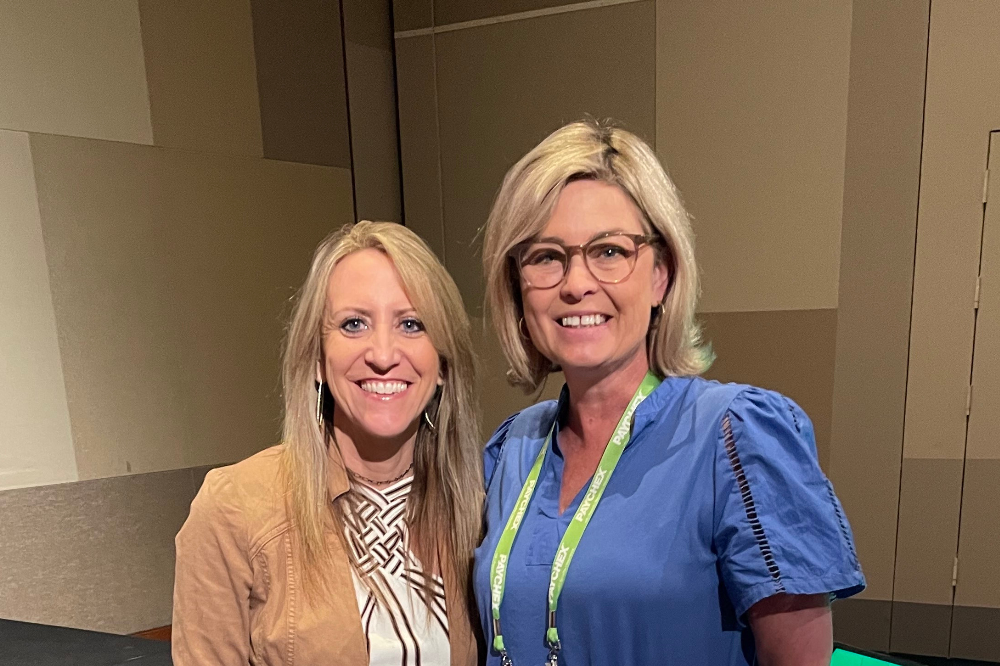 Image of two women at the AICPA ENGAGE Conference