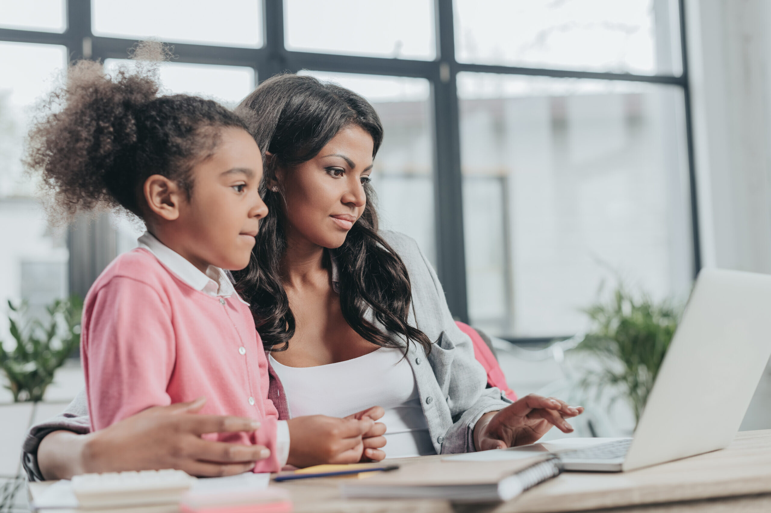 mother practicing work-life balance with daughter