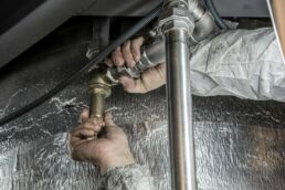 HVAC/plumbing contractor closeup; credit pexels-anilkarakaya