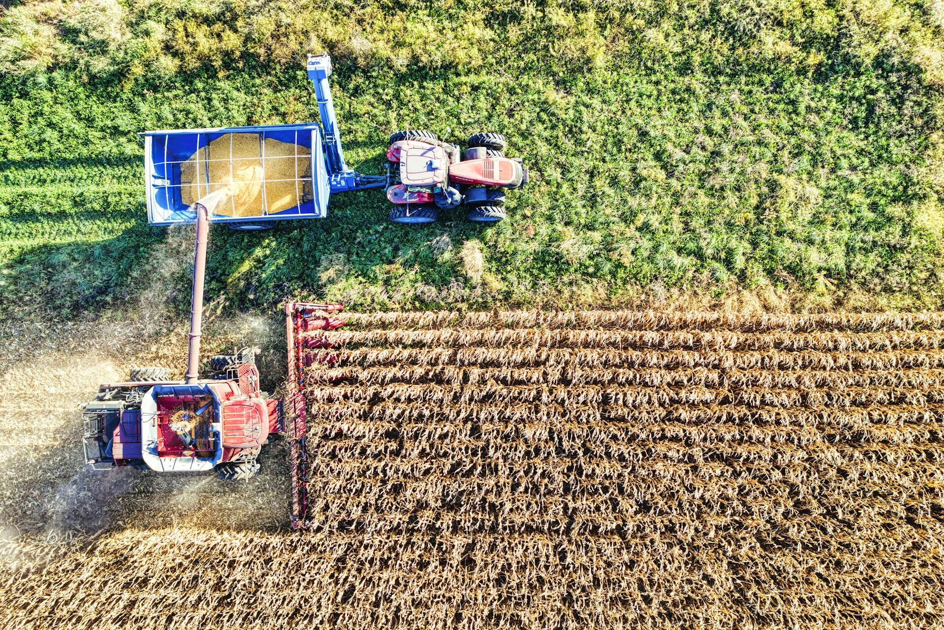 ag lending; combine harvesting grain