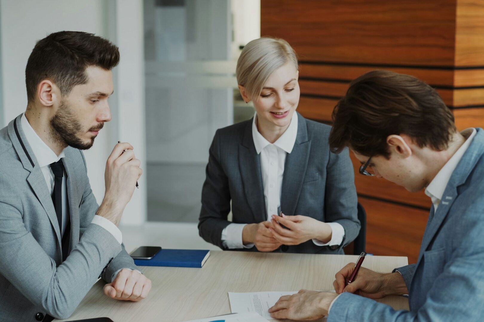bankers closing deal with client